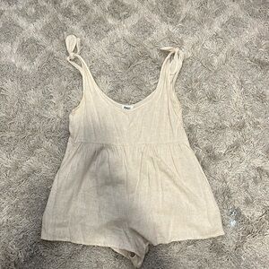 Women’s flowy romper with tie straps